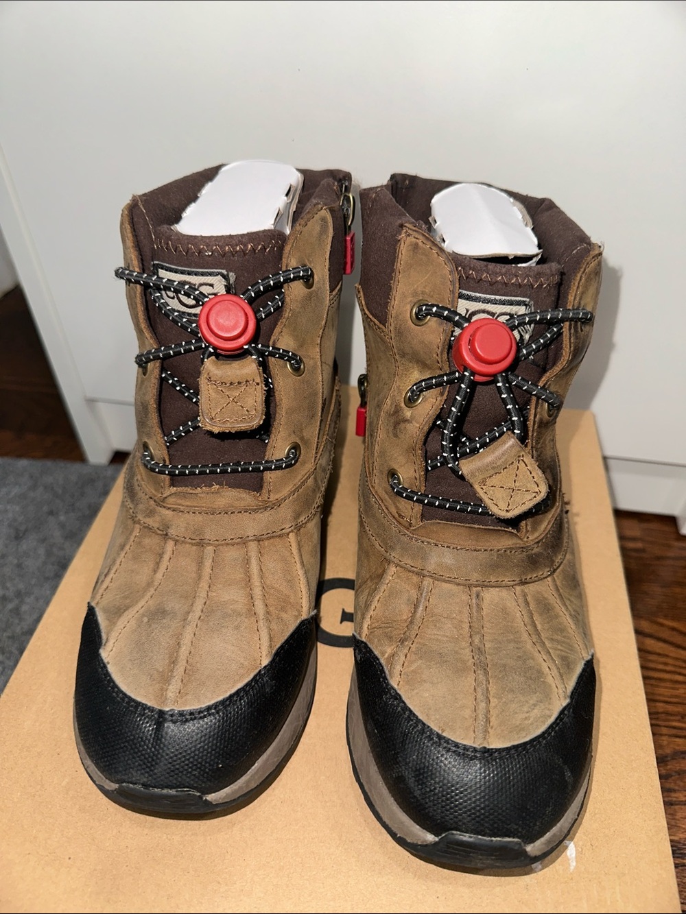 UGG Kids Brown and Black Winter Boots with Red Toggle